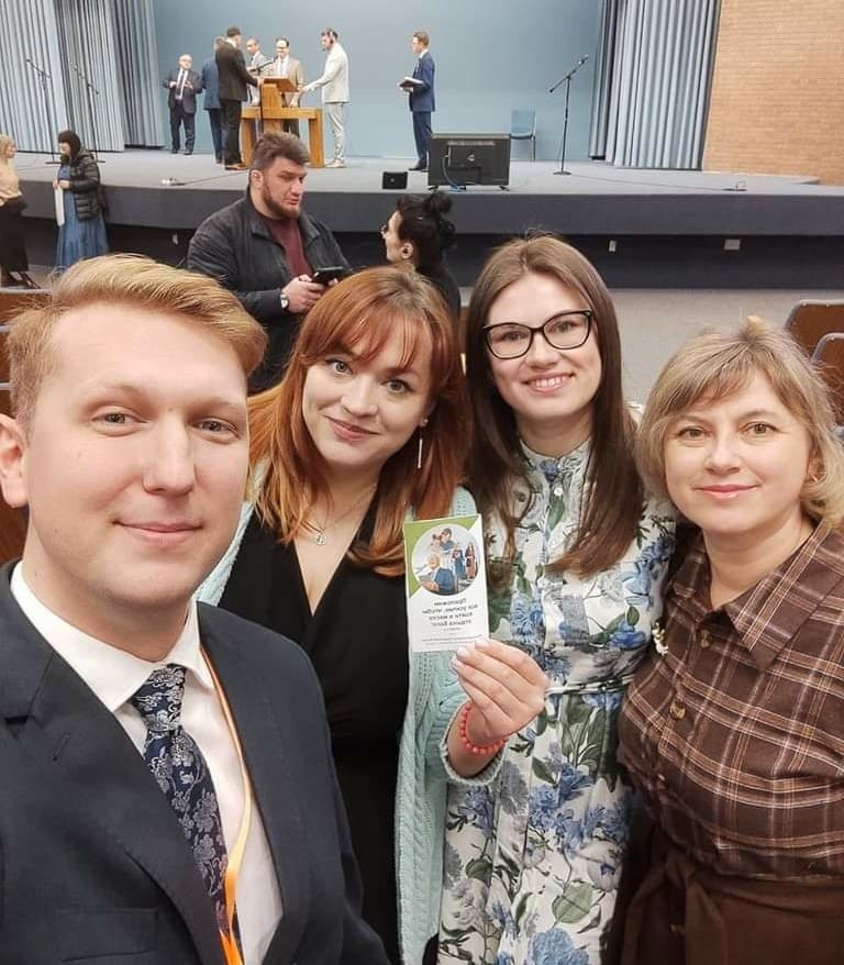 Community members posing for a group photo.